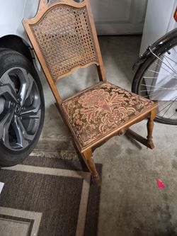 Antique Cane Back Chair with Floral Seat