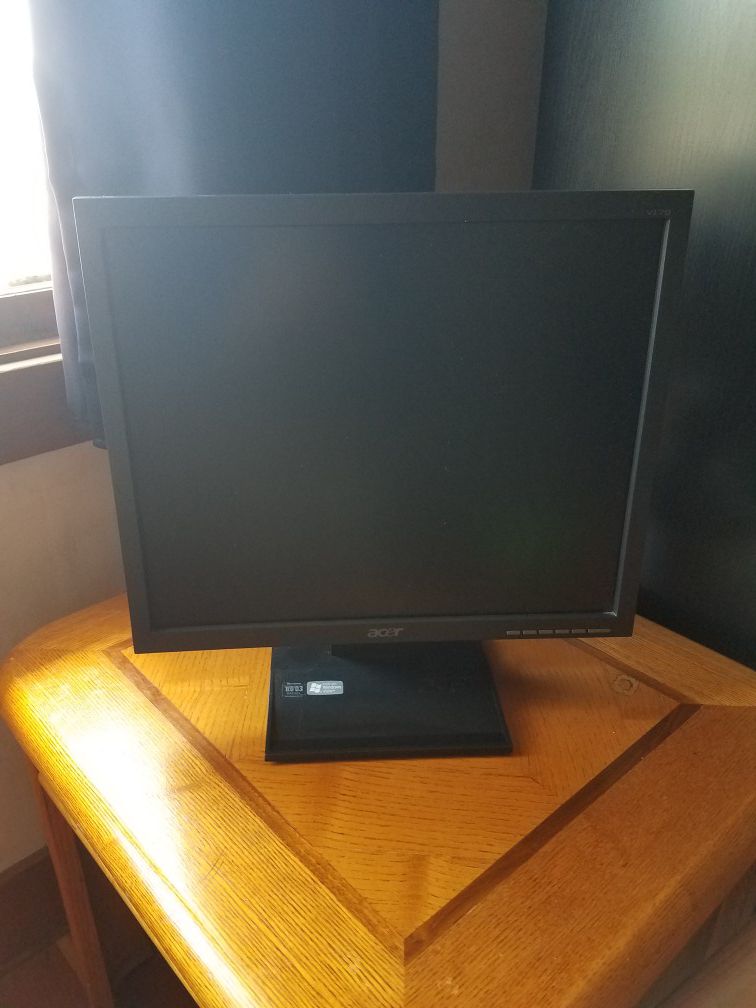 Black flat screen computer monitor