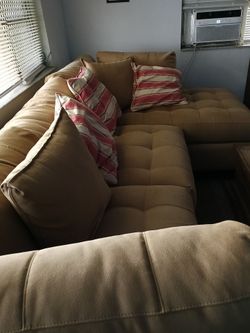 Cindy Crawford tan couch