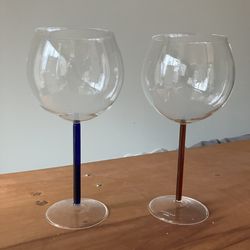 2 wine 🍷 glasses by cepriani red and blue stem. Cash only. Pick up only. Midtown West. These Color Accent Wine Glasses are handmade from borosilicate
