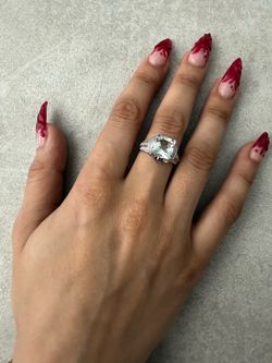 Genuine, 2 carat aquamarine, in 14k white gold  size 7