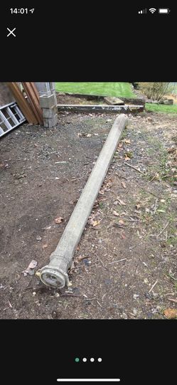 Antique gas light post, cement.