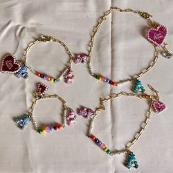 Mom and daughter Care Bears necklace and bracelet