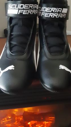 Pumas black and white size 12 exclusive