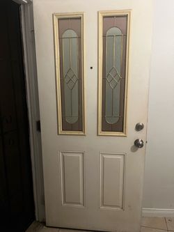 White Entry Door with Decorative Glass Panels
