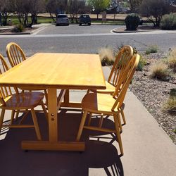 Solid  oak butcher block table with 4 oak chairs
