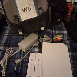 Nintendo Wii Bundle + Official Wii