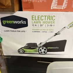 NIB Greenworks 12 Amp 20-inch corded electric lawn mower. 