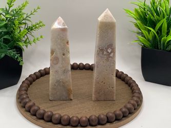 Natural hand carved pink amethyst flower agate mixed towers. Tower 175 g 5.5 inches and tower 204 g 5 inches.