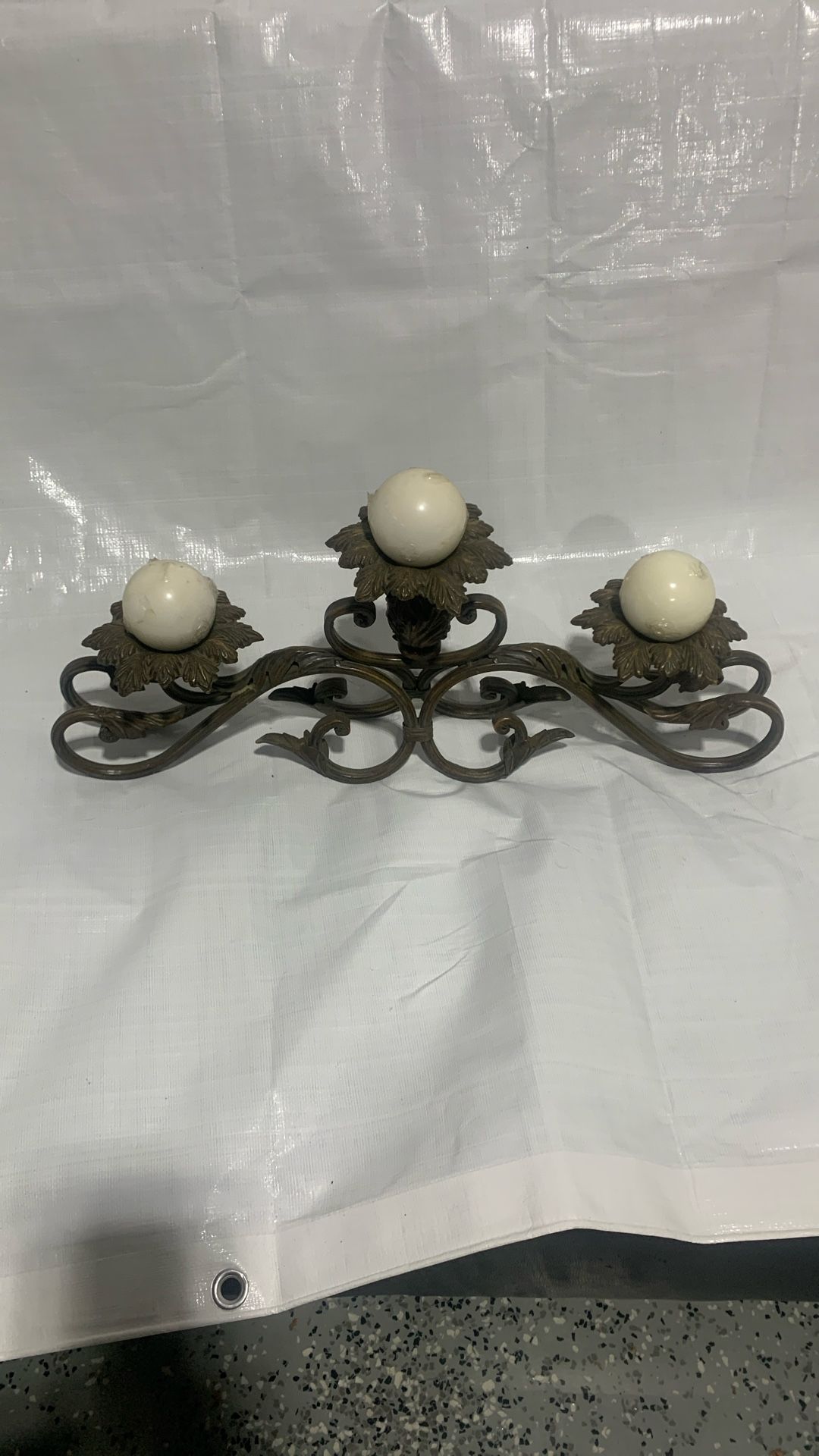 Metal candle holder with candles