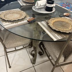 Glass table with chairs
