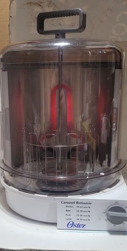 Oster Carousel Rotisserie...

Oster Carousel 4781 Vertical Rotisserie 650W 120V w/ Basket, Drip Pan, Timer .