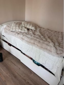 Twin size bed frame with deep drawers
