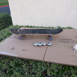 Skateboard  With 4 Extra Wheels 