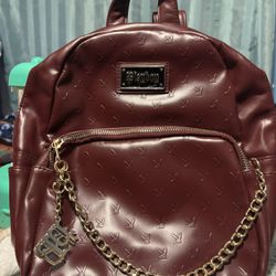 burgandy playboy small back pack