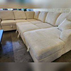Ivory corduroy sectional pullout sleeper bed woth USB port