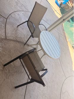 Patio table and chairs. $40