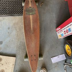 Long Skate Board And One Other Board