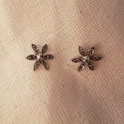 $75 White gold diamond flower stud earrings