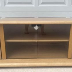 Wooden Entertainment Center With Shelf And Glass Doors $25