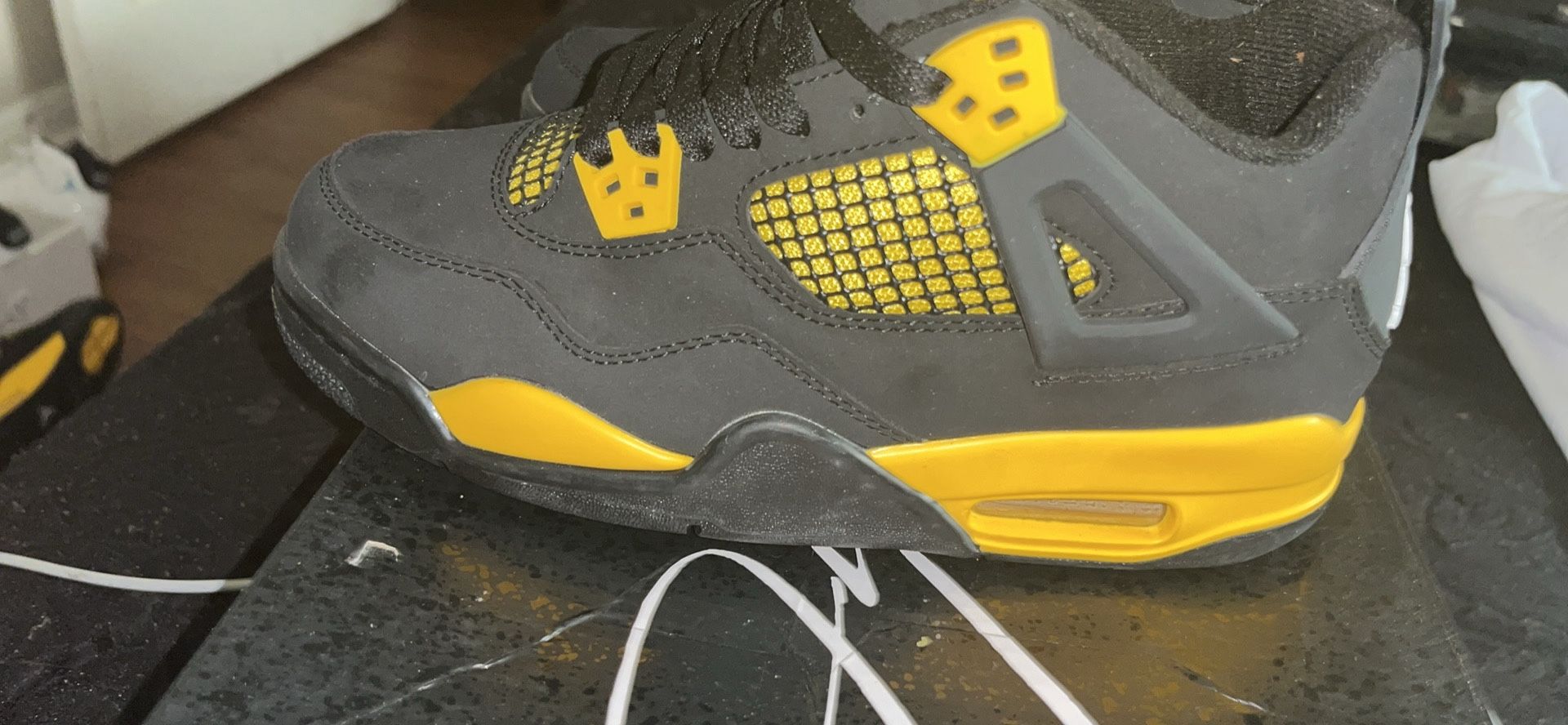 Air Jordan 4 Thunder Gos Black and Yellow
