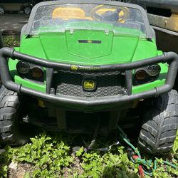 Kids john deer power wheel 