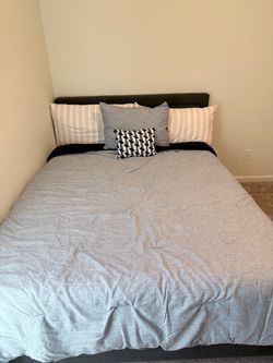 Queen Bed Frame and 12” New Queen Mattress for sale!