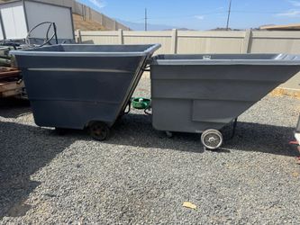 Large gray trash cans