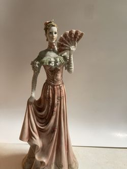 Porcelain figurine of woman 