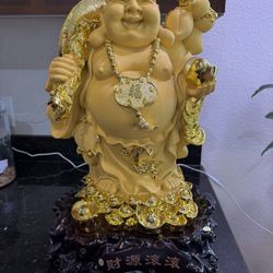 Beautiful golden Buddha happy statue