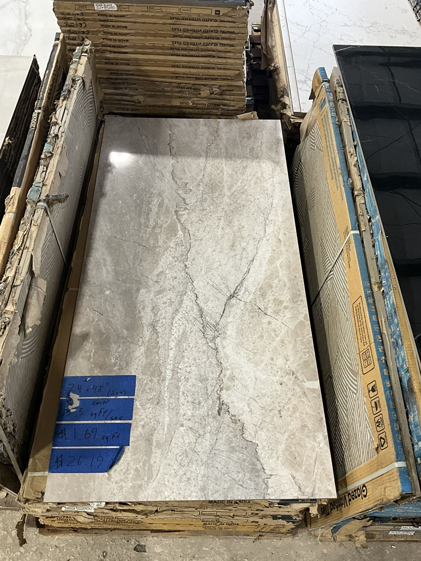 24 in. x 48 in. x 9 mm Polished Porcelain Floor and Wall Tile (15.5 sq. ft./Box) $1.69 /Sq.ft Luke’s liquidations warehouse Address: 2434 N Forsyth