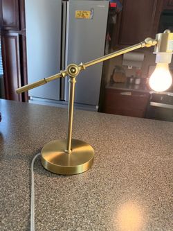 Adjustable gold desk lamp