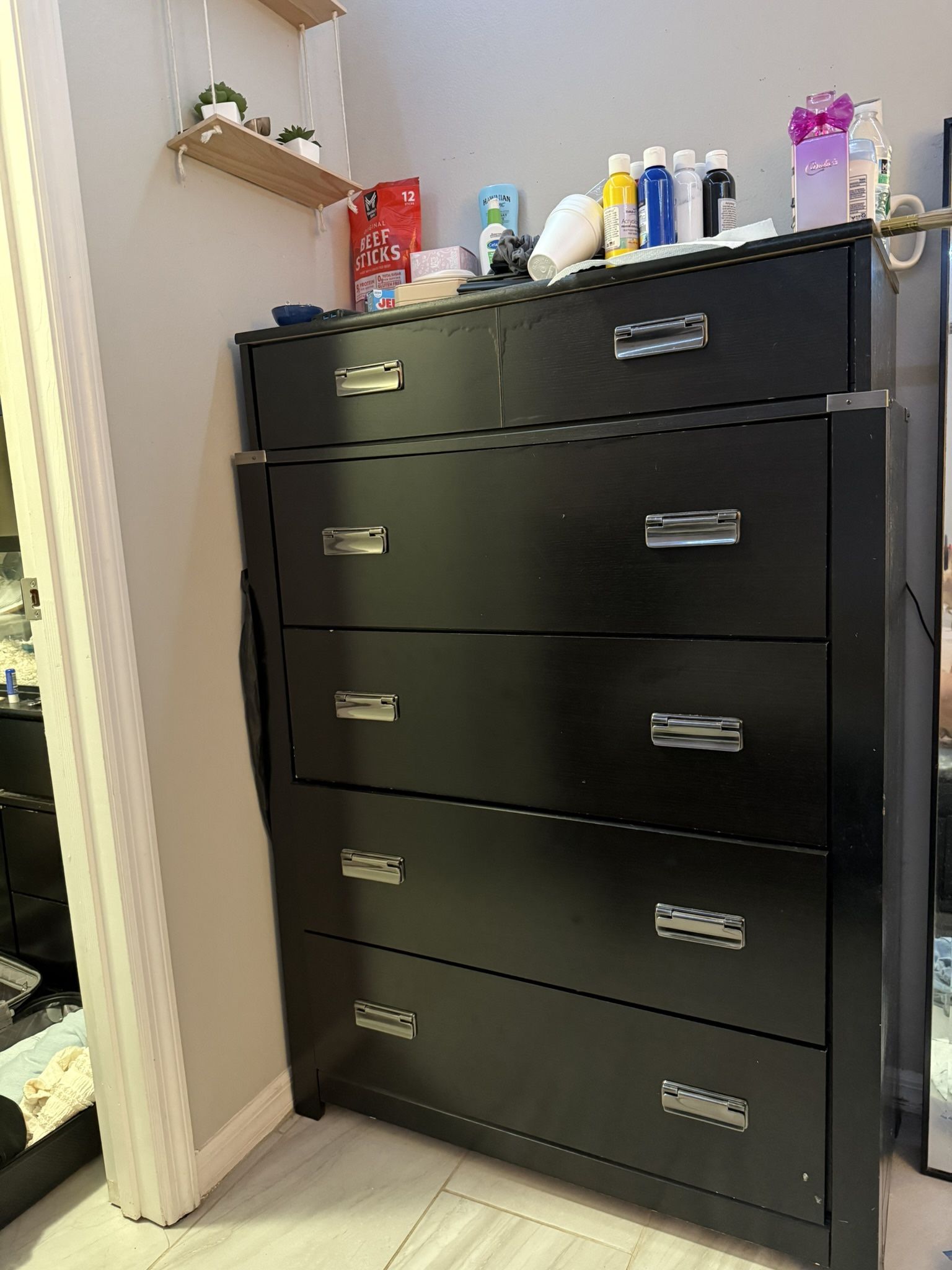 Tall black dresser