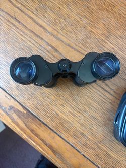 Vintage tasco binoculars with soft carrying case