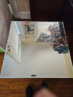 Three mirror  tables  to medium  and large center piece  good condition  the larger one  just has a chip on the corner