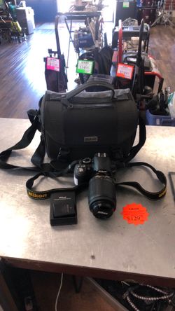 1003 14.2mp DSLR Camera W/ 55-200 Nikon DX Lens, 1 Battery, Charger and Soft Carry Bag 550614