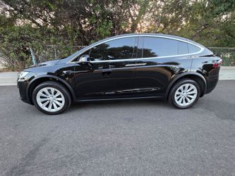 2018 Tesla Model X, I would consider taking monthly payments