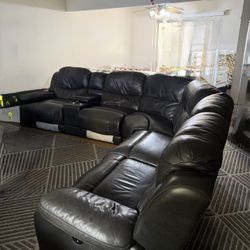 This Pulaski Furniture Leather Power Reclining Sectional