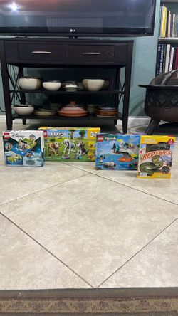 Lego Creator Adorable Dogs 475 Pieces, Lego Peter Pan & Wendy 111 Pieces, Lego Friends Sea Rescue 203 Pieces, Pocket Explorers Reptiles