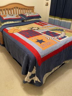 Quilt full size, full sheet,fitted sheet and two pillowcases,2 shams,2 curtains, 2 bins,lamp, 2 wall pictures and double layered blanket