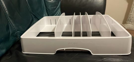 This is a YouCopia StoraLid container lid organizer.  