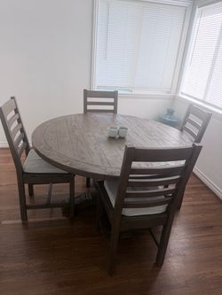 Round Wood Dining Table with 4 Chairs living spaces