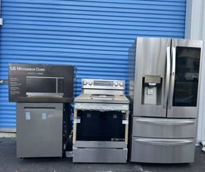 Complete LG stainless steel kitchen appliance package. Includes refrigerator, stove, microwave,