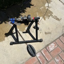 Bicycle stand converts bike to exercise bike
