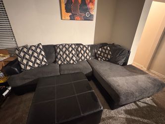 Two piece L shaped sectional and  foot rest