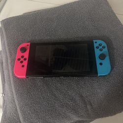 Nintendo Switch + Games 