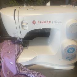 Singer Sewing Machine $ 55 