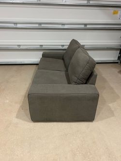Grey love seat