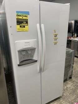 Frigidaire side by side in glossy white