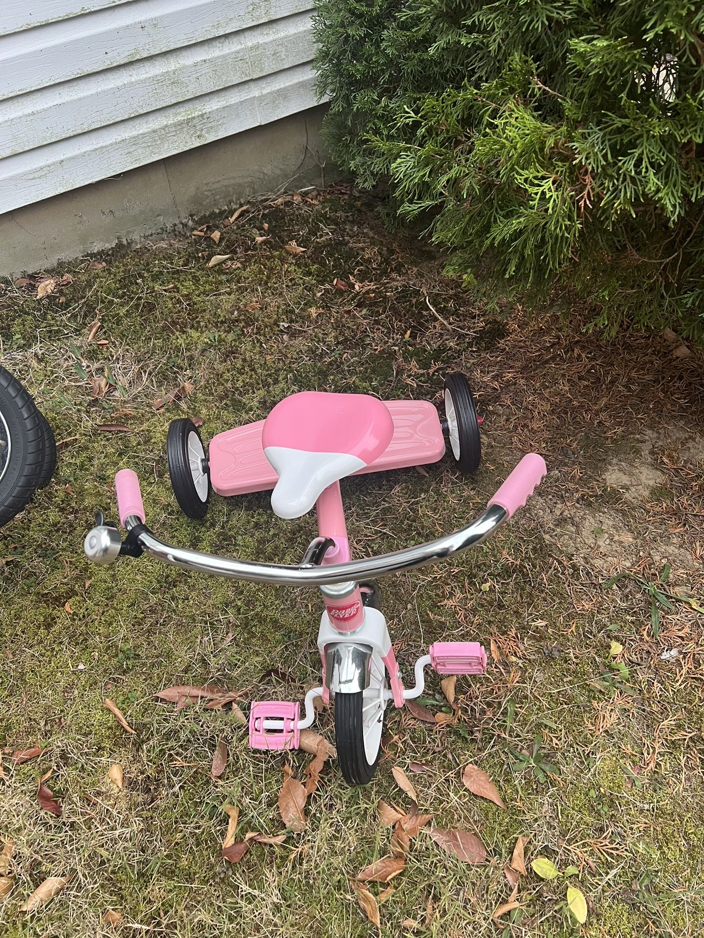Radio flyer pink tricycle.
